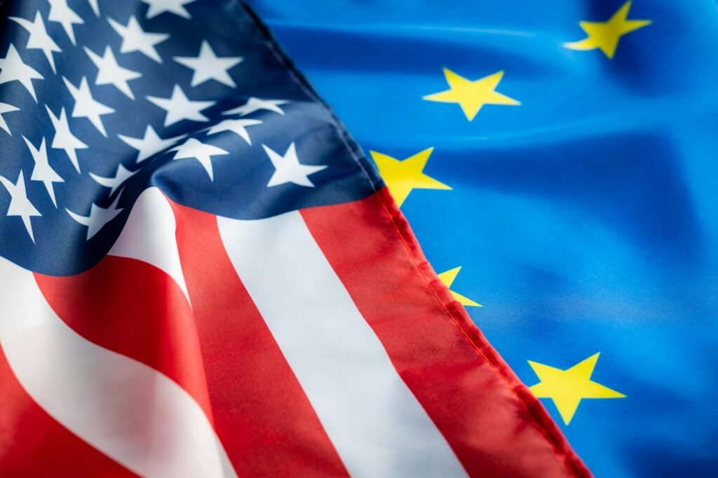 Eu europe union flag and usa united states of america flag. Two waving flags